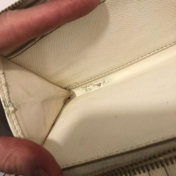 Coach debossed creamy white double zipper wristlet